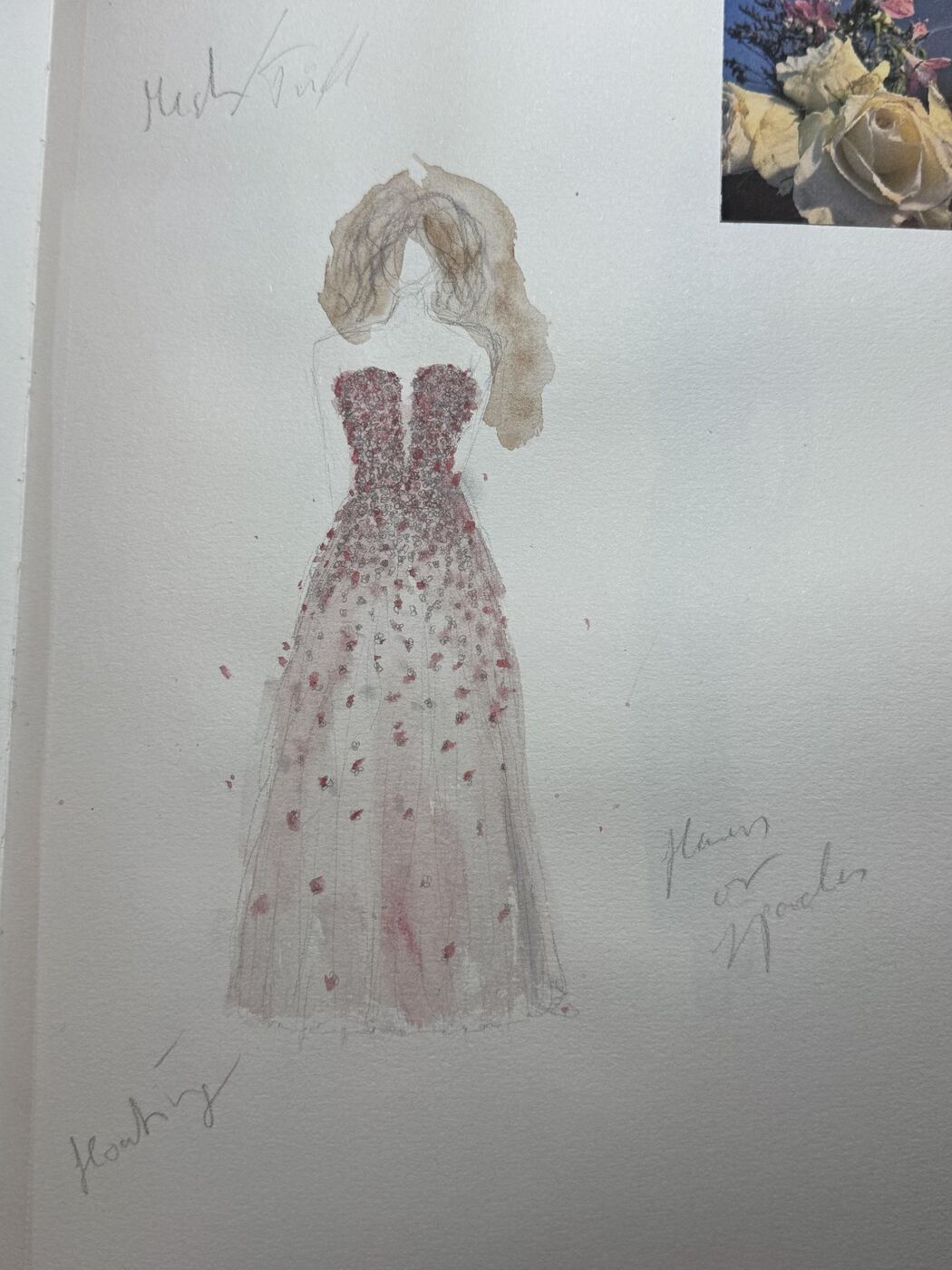 Hand-drawn design sketch with drape and seam notes